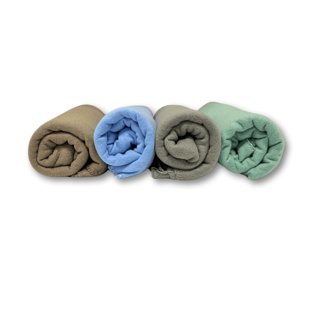 Brown, Blue, Gray, Green Blanket Rolled up